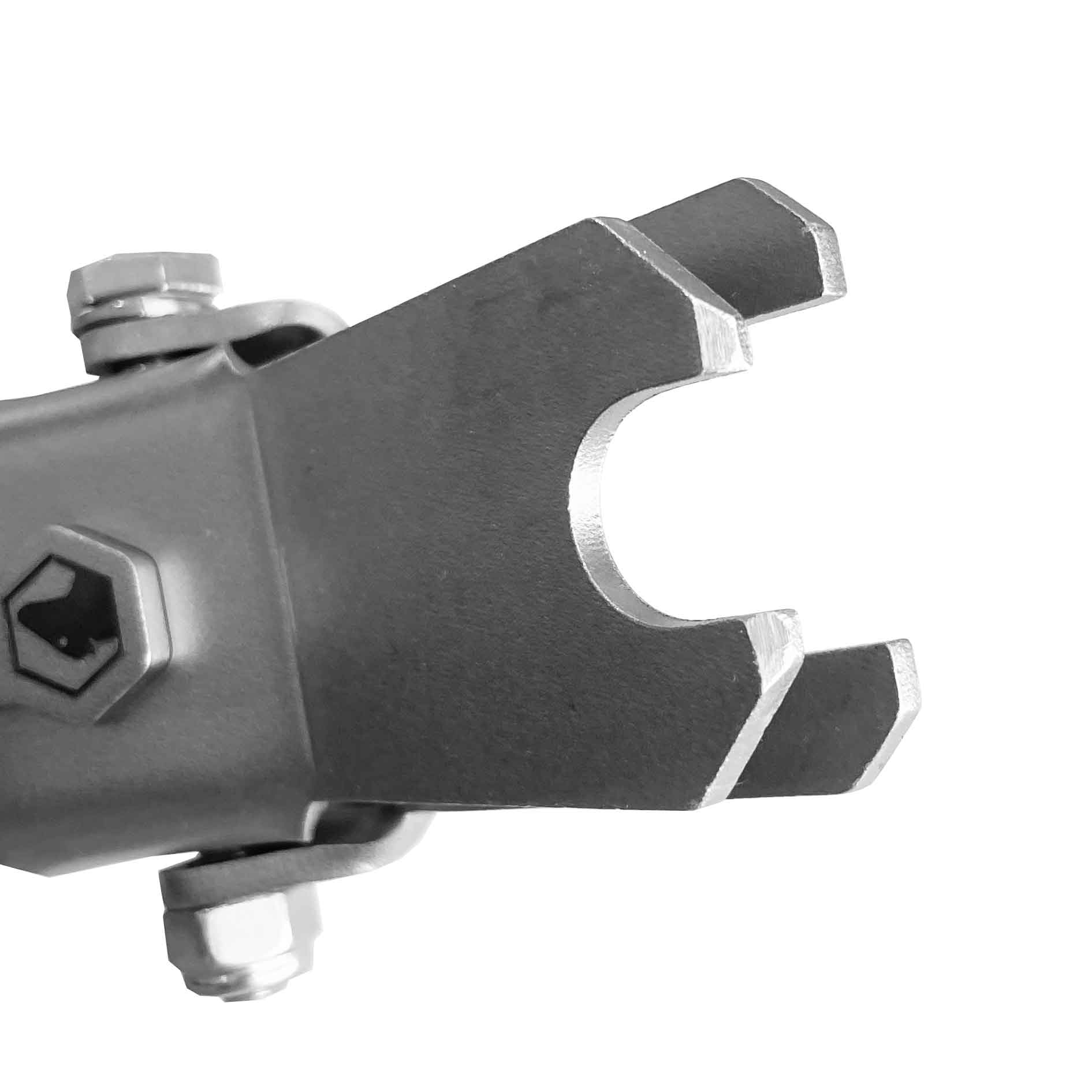 Close-up of a metallic tool or component on a white background